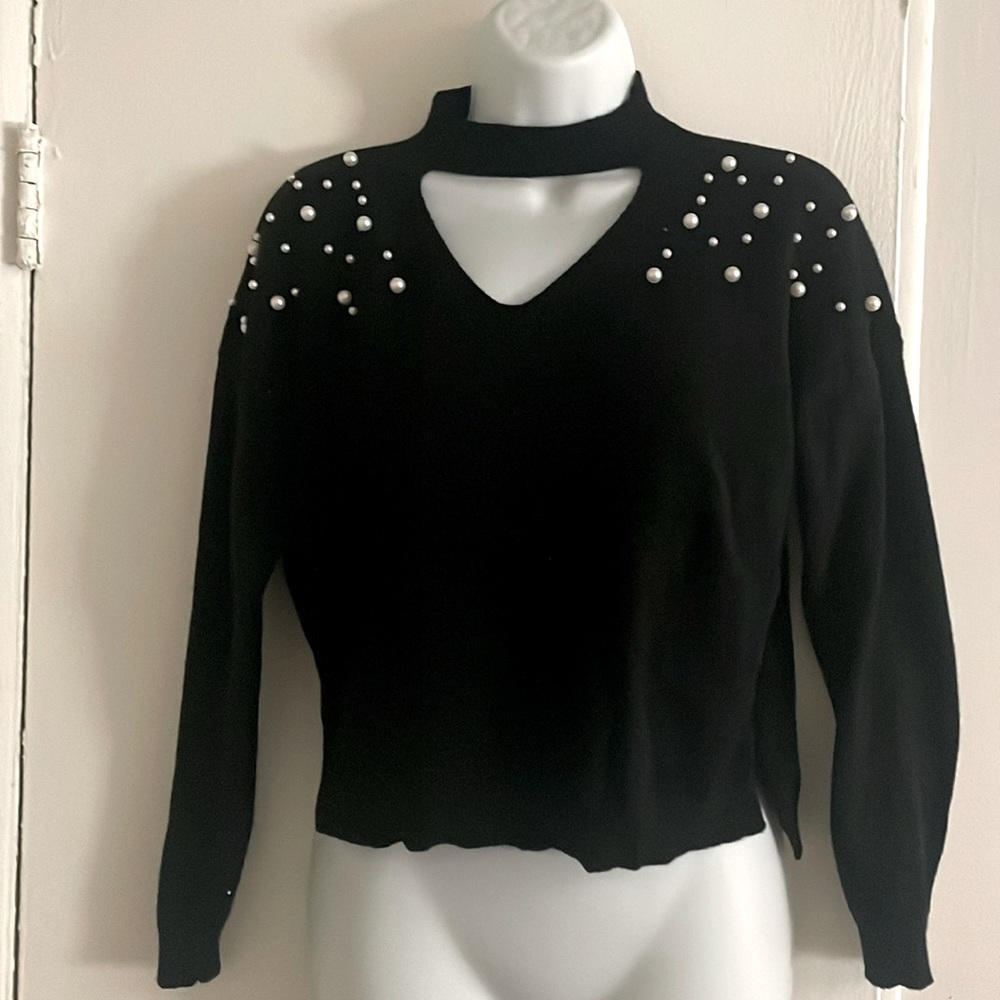Black sweater with pearls